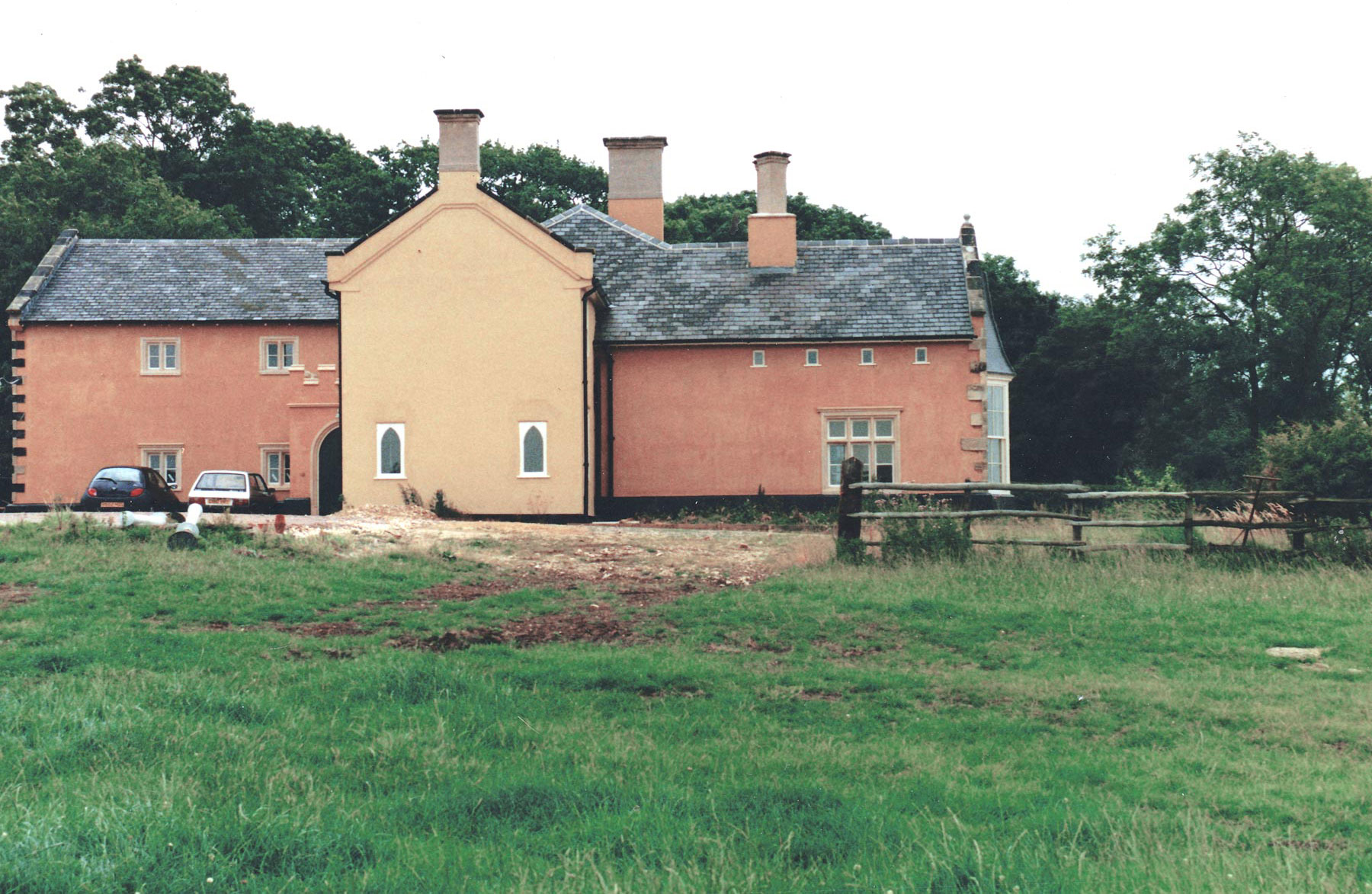 A newly restored country lodge prior to landscaping the grounds